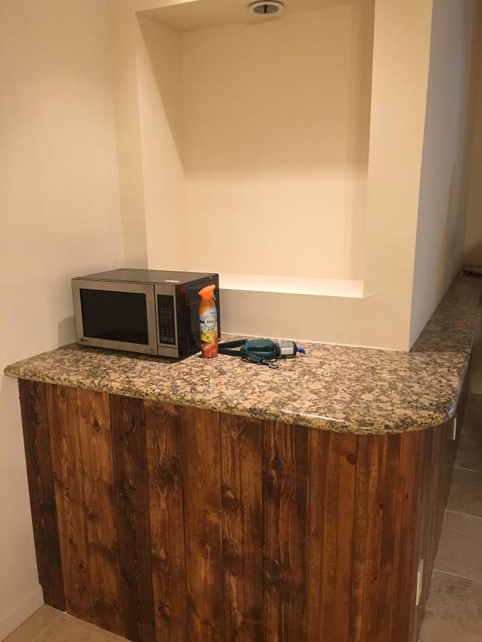 Granite counter with display alcove.